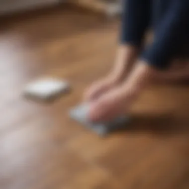 Application of felt pads on a wooden floor