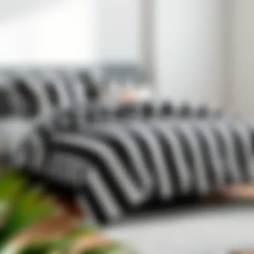 Modern Elegance of Stripes A stylish black and white vertical striped comforter on a modern bed frame.