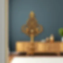 Elegant brass over the door hook with decorative elements.