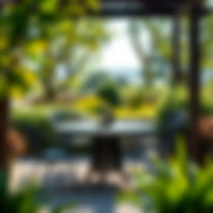 Stylish Outdoor Round Table Set Stylish outdoor round table set amidst a beautifully landscaped garden