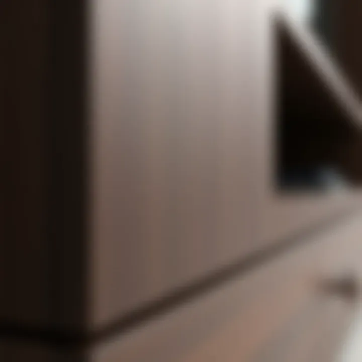 Close-up of the finish on a dark wood TV stand.