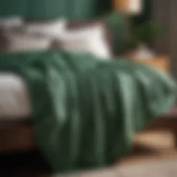 Luxurious green throw blanket draped over a bed