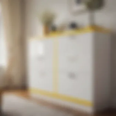 Elegant White Cabinet with Yellow Drawers Elegant white cabinet featuring bright yellow drawers
