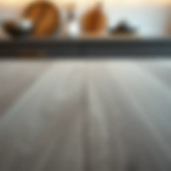 Close-up of the texture and grain of gray butcher block wood.