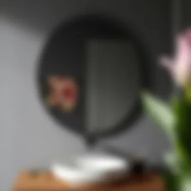 Material Matters: The Finish of Grey Oval Mirrors Close-up of a grey oval bathroom mirror showcasing its material and finish