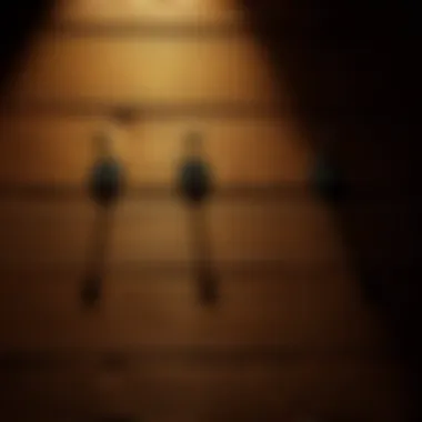 Stylish Metal Hooks on Wooden Wall Stylish metal hooks on a wooden wall