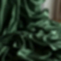 Luxurious dark green satin sheets draping elegantly over a bed