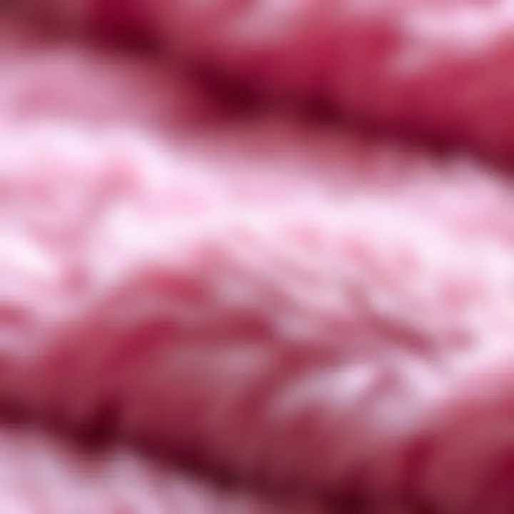 Close-up of plush pink fur fabric showcasing texture and quality