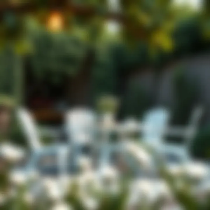 White resin chairs arranged around a garden table