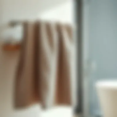 Luxurious oversize bath towel draped elegantly on a modern bathroom rack