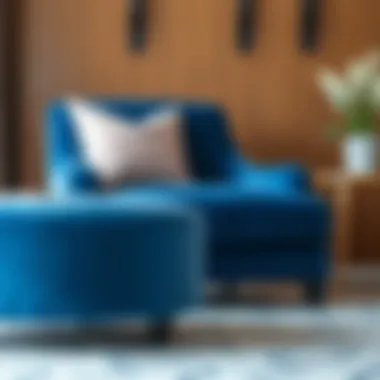 Close-up of a plush blue accent chair paired with a stylish ottoman