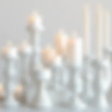 Close-up of white tall candle holders made from different materials