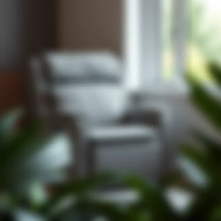 Gray Recliner in Window Nook Small gray recliner positioned by a window for natural light